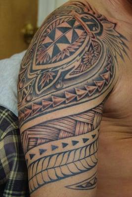 tribal half sleeve in progress..