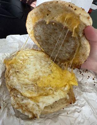 Sausage, egg and cheese on a garlic bagel