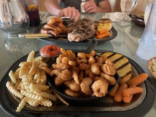 Popcorn Shrimp Dinner - comes with one side and either the salad bar or soup. Huge portion of shrimp for $26!