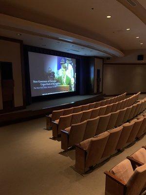 Interior - theatre where introductory video is played