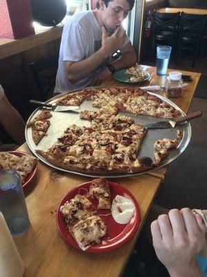 28" pizza. Half sundried tomato half bbq chicken