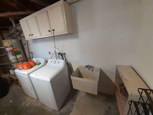 All new drywall in garage due to mold and leak, reset sink, reset washer and dryer.