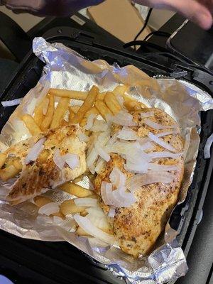 Chicken and onions over fries