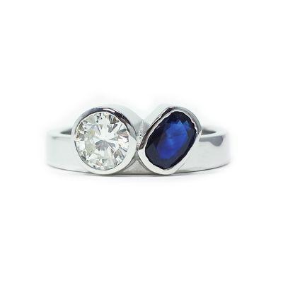 Custom two stone, Diamond+ Sapphire bezel set ring.