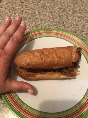 My hands bigger than this roll...it doesn't seem to have any life left in it  it's given up because of its failure to be a great sub