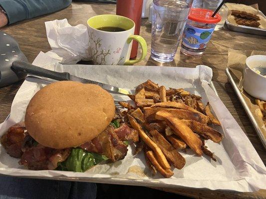 BLT (gluten free bun) w. Avocado, and French fries.