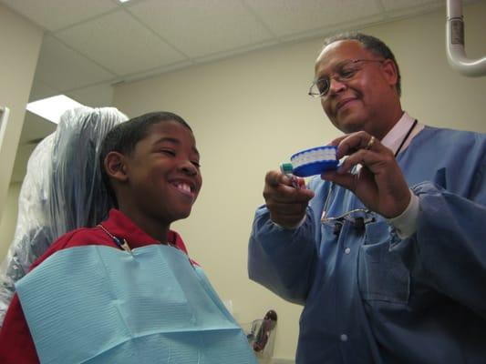 Dr. Wright and a young patient.