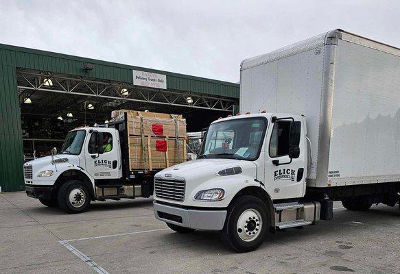 New box truck and flatbed truck