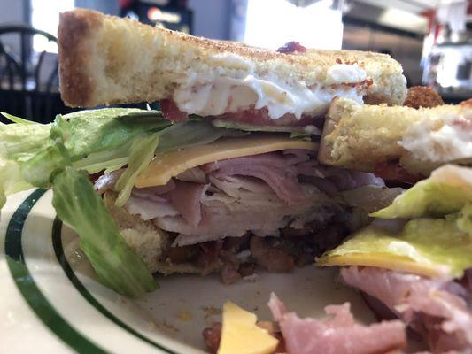 Club sandwich with breaded mushrooms