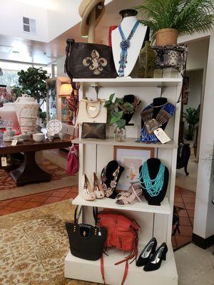 You'll find designer handbags, shoes, and jewelry.