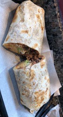 Steak burrito, added rice. Delicious!