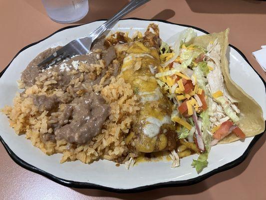 Chicken enchilada and taco lunch plate. And yes, I already stirred the rice and beans.