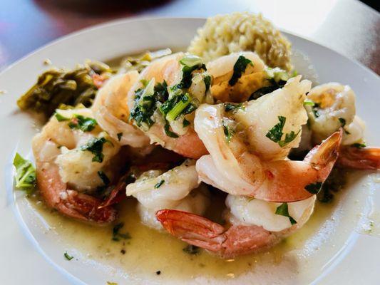 Grilled jumbo shrimp with green beans and rice pilaf.