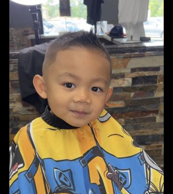 Jay's son with a mid skin-faded faux hawk