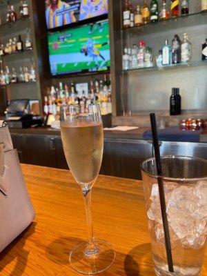 Champagne and football at the bar