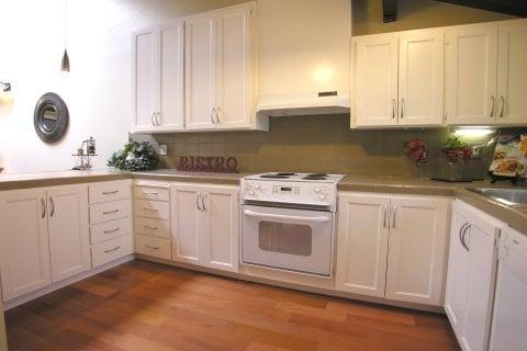 Good preparation says it all. This kitchen had bluer tile counters. We didn't replace them, just coated them. Instant make-over!