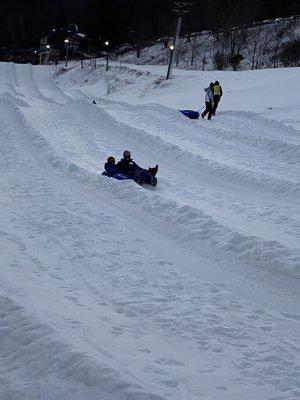 The boys making their way down the slope