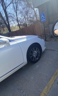 Better Wash Employee parking ON a handicap ramp in a handicap spot with no handicap plate or tag.