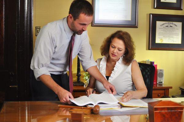 Personal injury attorney Flora Templeton Stuart working on a case with staff.