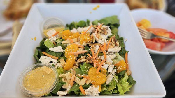 Orange Walnut Salad $10.75: Chicken, Spinach subbed with Romaine, Mandarin oranges, carrots, wontons, walnuts w/ side of fruit