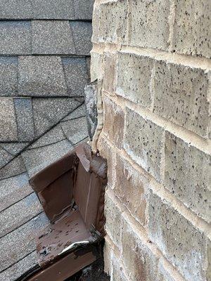 z-flashing exposed through brick