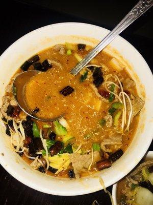 Spicy beef soup in chili oil