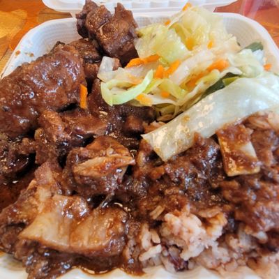 Ox-tail, rice w/beans and cabbage.