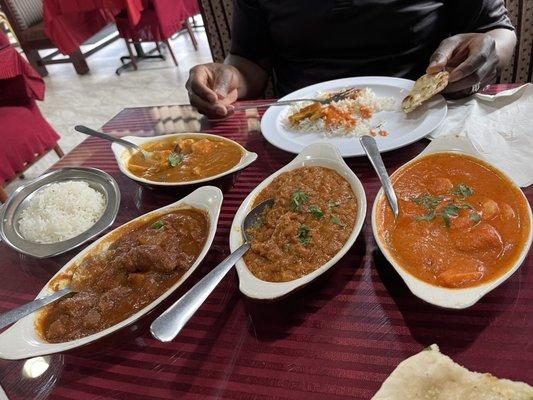 From right to left, Buttered Shrimp, Baingan Bhartha, Lamb Vindaloo & Chicken Curry