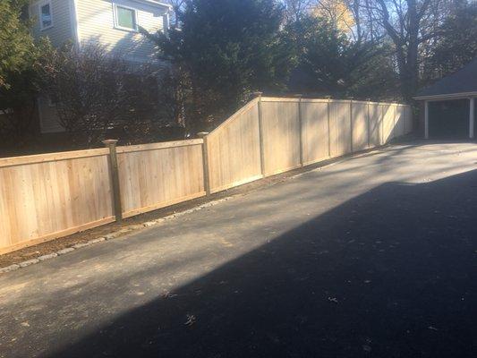 Cedar board Fence with 5"x 5" pressure treated posts and 1"x 4" fascia boards