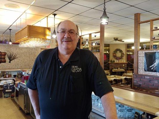 John behind the bar