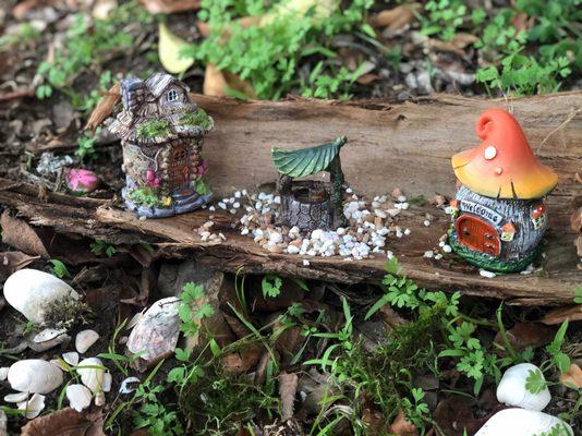 Fairy houses in a nature exploration area for kids