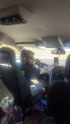 The driver recording us AFTER he chewed us out and nearly kicked us with our 3 and 5yr old children out on the freeway on ramp.