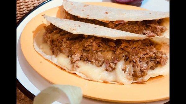 Chicharrón prensado. Pork mix with red or tomatillo salsa