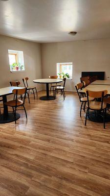 Upstairs area. Very cute and quaint.  Good for meetings, groups etc.