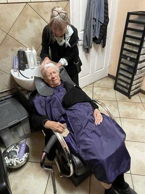 Mother-in-law getting her hair washed pre-haircut.