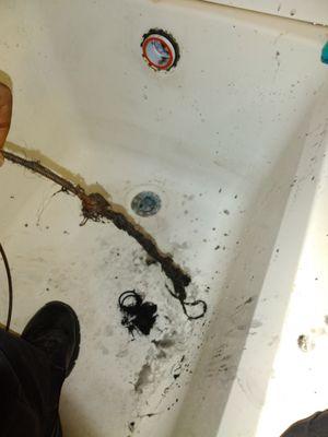 Unclogging a tub drain