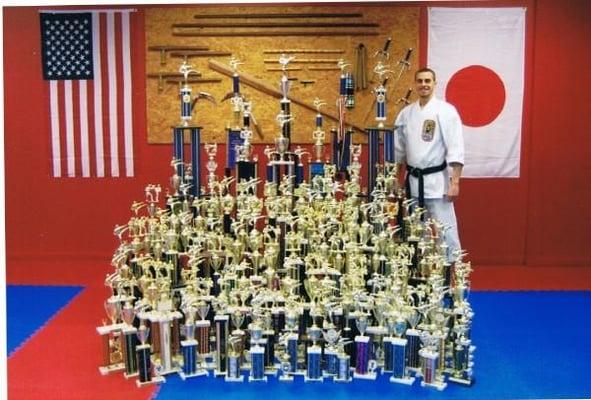 Sensei Bobby roeder with his trophies.