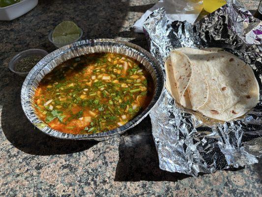 Menudo and flour tortillas.