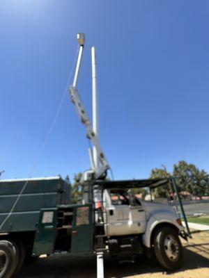 A picture of our telescoping boom lift reaches 80 feet high