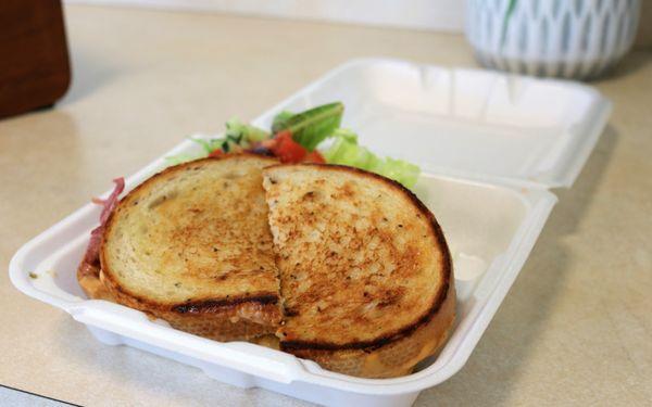 A classic Reuben Sandwich with our side House Salad