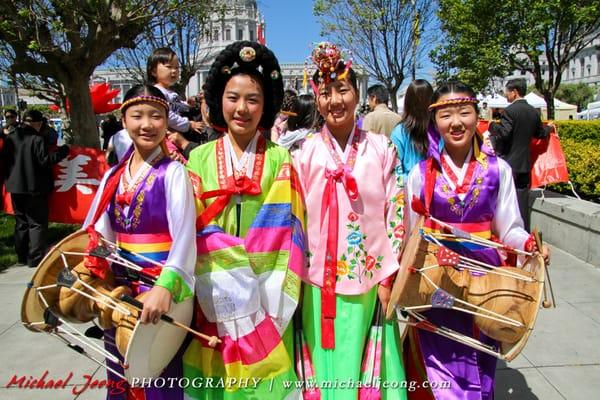 Faces of Asia Cultural Procession kicks off the street fair each year. Here is a Korean contingent.