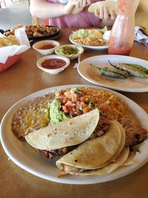 Shrimp fajitas,   pork tacos