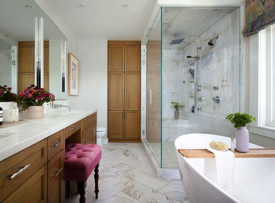 Primary Bathroom with freestanding tub, walk-in shower and seated makeup vanity