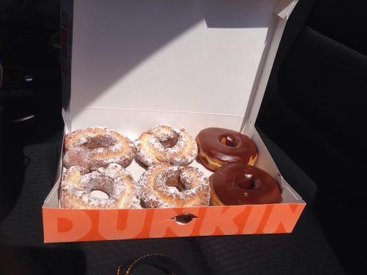 A box of perfection. Powdered sour cream donuts and chocolate glazed