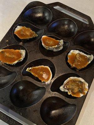 Six baked oysters