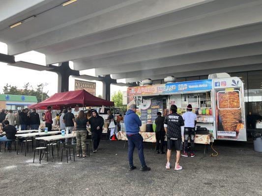 Order/pay at the cart. Then bring your receipt to the food prep line on the left