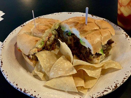 My 81 Torta: carne asada, beans, cheese, tomato, onions, lettuce, AVOCADO , and jalapeños.