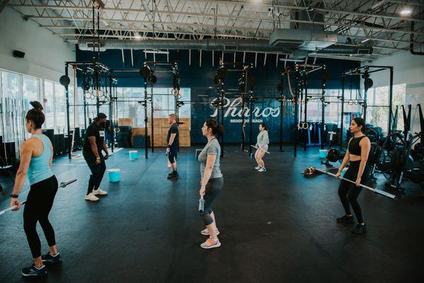 Our group classes offer both Strength + Conditioning as well as CrossFit.