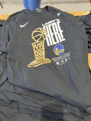 Get your Warriors Champs gear here, various sizes for women, men & kids.