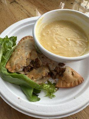 Beer cheese soup and empanadas.